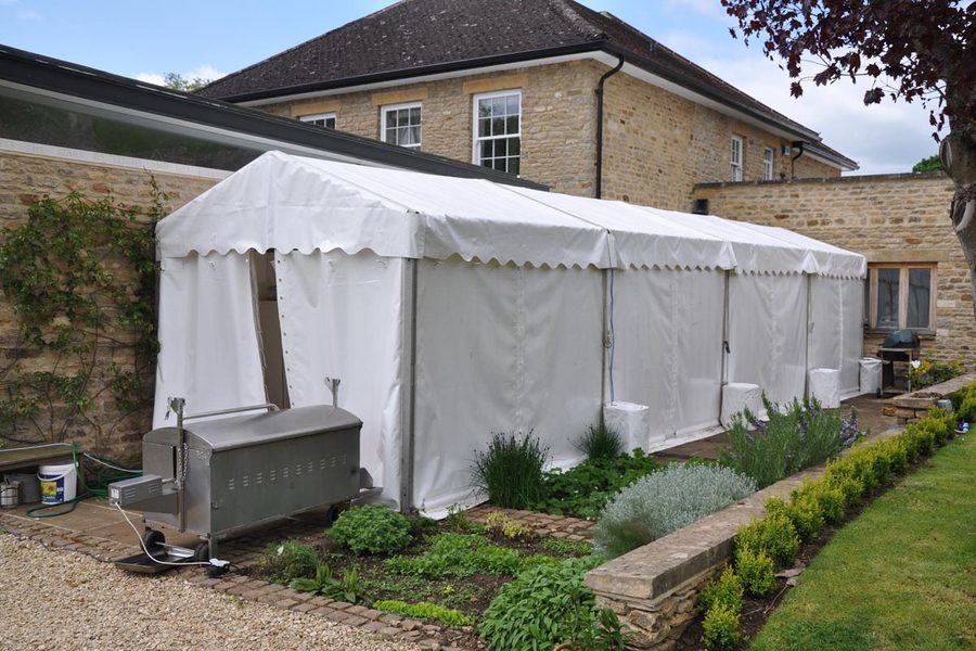 A 3m by 12m catering tent linked to a larger marquee