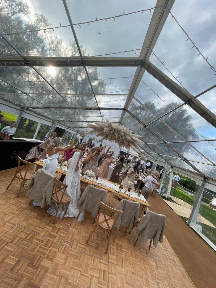 A 9m by 18m frame marquee with a clear roof