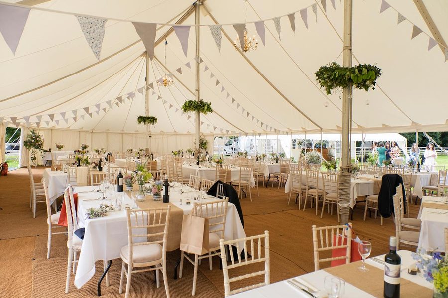 A decagon traditional canvas marquee, 12m by 30m